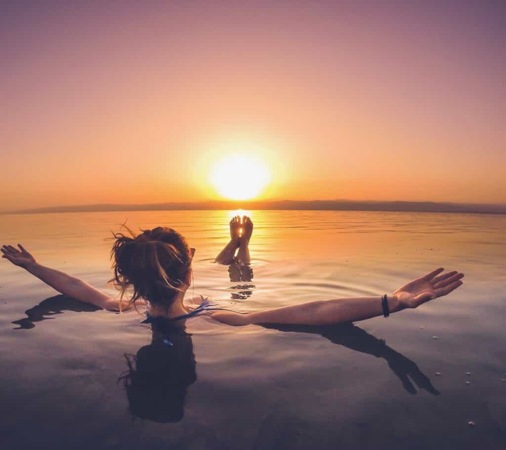 Woamn Floating in the Dead Sea